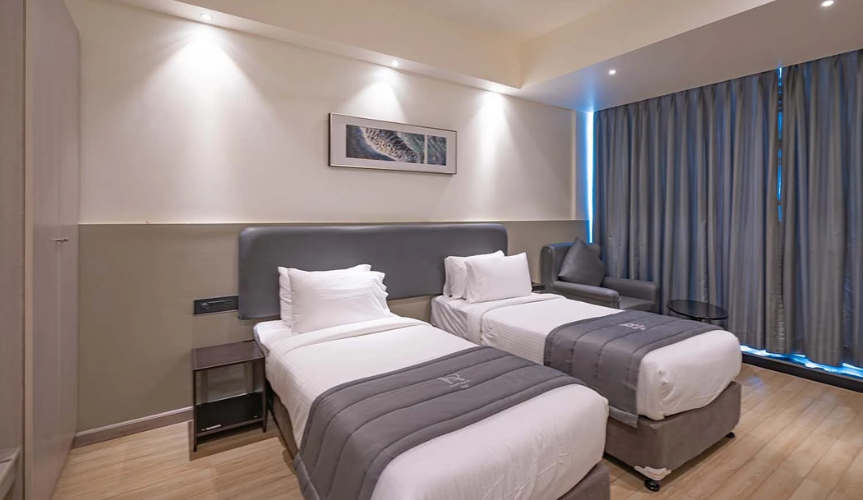 Twin Bed Room at Garudadri Nagar Cottages near Tirumala Temple